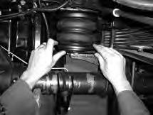 8. As in the previous step, move the bottom bracket inward and outward so as to align it with the bellows and the upper