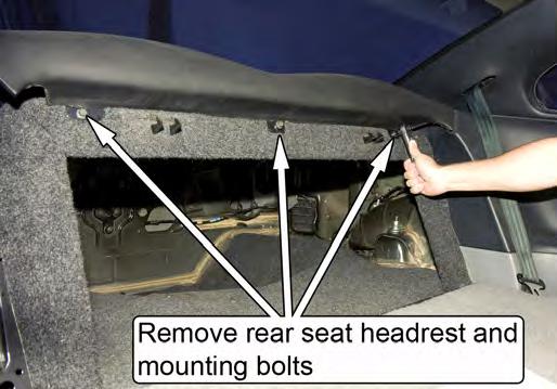 7. Remove the rear seat headrest.