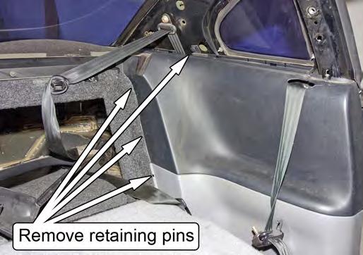 Remove the lower plastic quarter panels by pulling forward on the B-pillar edge.
