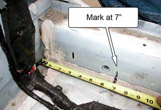 16. Starting at the rear corner of the driver-side floor pan, make a mark 7 forward of the corner, along the rocker panel. Repeat for the passenger side. Main Hoop Installation 20.