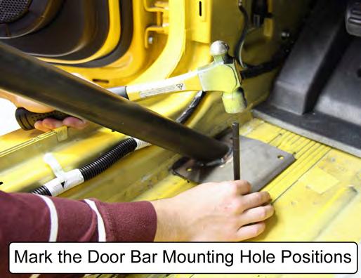 Mark the position of the four mounting holes in each door bar mounting pad onto the