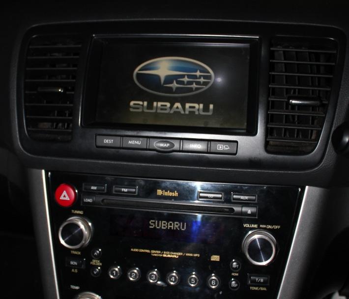 Now that your sat nav is on, insert the GENUINE SUBARU MAPS DISC into the Navigation drive.