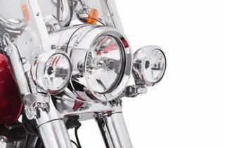 LIGHTING 685 Headlamps Auxiliary B. CUSTOM AUXILIARY LIGHTING KIT Shaped by the wind, this Auxiliary Lighting Kit follows the contours of the triple tree and headlamp shell for a custom look.