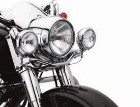 B. AUXILIARY LIGHTING KIT SPRINGER MODELS Chrome mounting bracket nicely accents Springer front end and offers an integrated factory-installed appearance.