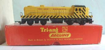 3S.02B 00 Railway - Tri-ang Locomotives with boxes Tri-ang R155 T-C Series Bo-Bo Diesel 'Switcher'. Yellow with red lettering 'Triang Railways'. Black hazard chevrons all round.