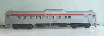 3S.09 00 Rrailway - Tri-ang Locomoitves without boxes Tri-ang R58 Diesel 'B' unit, non-powered, silver with red waistband carrying block lettering 'Tri-ang Railways' - 4008'. Without cab.