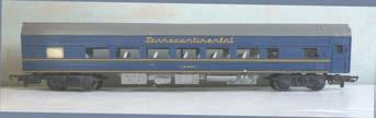 3S.36 00 Railway - Tri-anf T-C Cars - Blue/straw Tri-ang R131 T-C Series bogie Saloon Car, blue with straw lining Italic script over windows. No. 70831. tension-lock couplings.