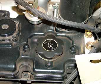 Engine oil fill cap 2. Before installing a new element, inspect it by placing a bright light inside and rotate the element slowly, looking for any holes or tears in the paper.