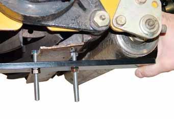 Place underneath side of bolt head over bed knife full roller contact across both rollers to give a reliable level cut. Figure 4-52.