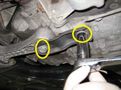 The two bolts for the lower dogbone mount are removed as well using a