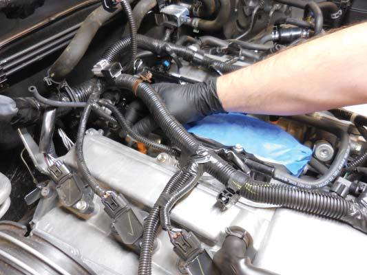This will allow the injectors to get located easier onto the intake manifold. 54.