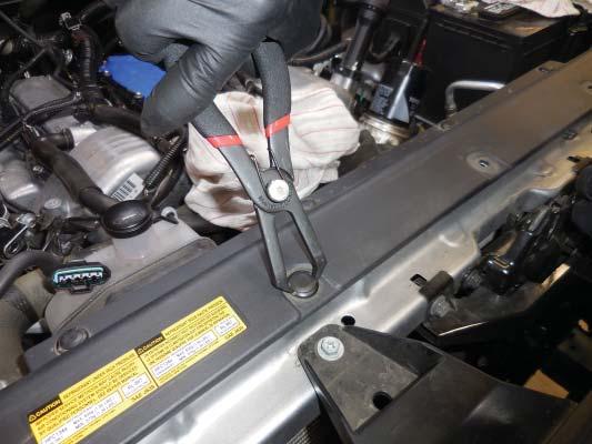 69. Reinstall the electrical connection for the ignition coil.