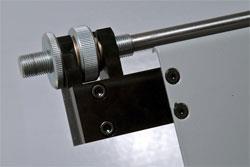 knob in position Releases and tightens feed rails to adjust for alignment Releases and