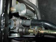 Install the oil pump cable. Make sure the lock nut is secure! Check for smooth operation of the oil pump.