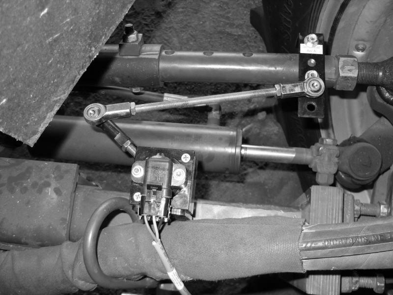 Attach Wheel Angle Sensor and Linkage Rods 6. With the linkage rods disconnected, start the vehicle and manually turn the steering wheel so that the vehicle will travel straight ahead when moving. 7.