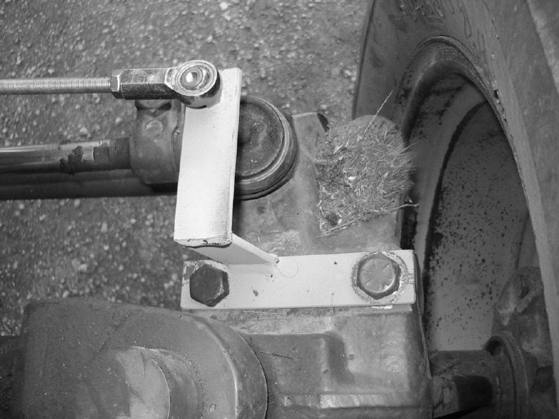 Note: Caution must be taken when removing the bolts to ensure the drag link assembly does not fall off. Note: A breaker bar may be necessary to loosen the bolts. 9.