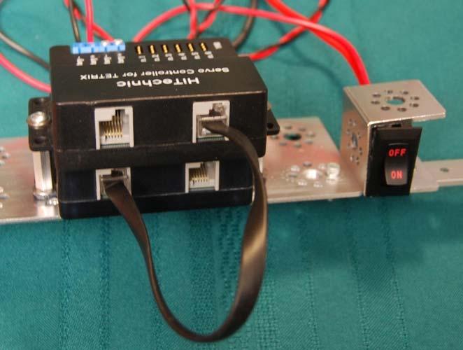 7. Connect the left hand jack of the motor controller to the right hand jack of the