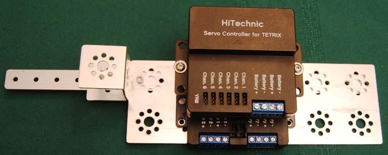 Attach the servo controller using the washers and button head