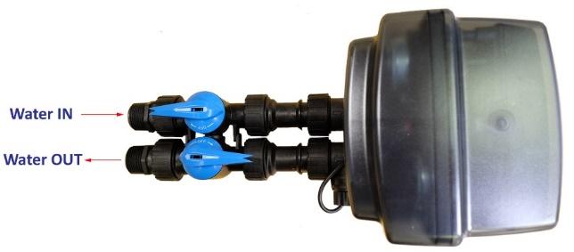 The inlet and outlet are attached to the bypass valve, which is marked with arrows as well. 3.