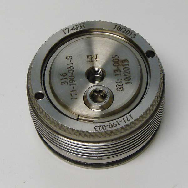 Disks 2. Place the locking ring (#171-190-023) around the cap. 3. Place the retaining ring (#130-81-040) into the groove around the outside of the cap.