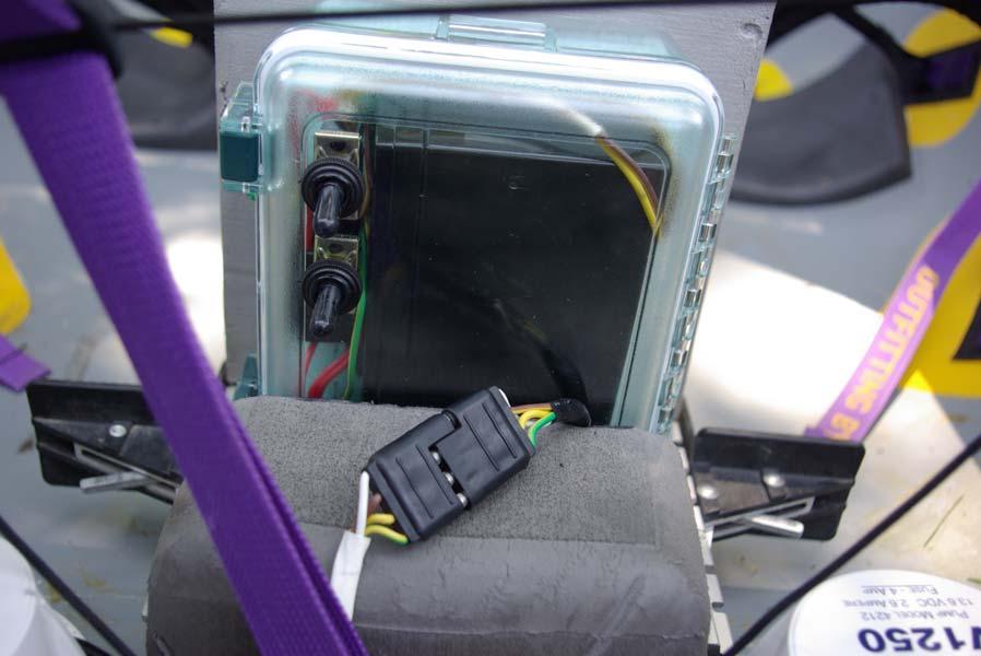 Front view of battery pack in place (less the strap and bungy cord): Side view of