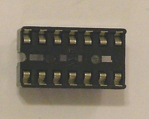 Figure 17. The numbering of the pins of an IC One the CheapBot-14 controller, the proper placement of the PICAXE-14 is indicated by a rectangle labeled U1.