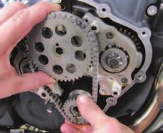 6 Using a 15mm socket and an impact gun, Dan removes the pinion sprocket bolt and the center