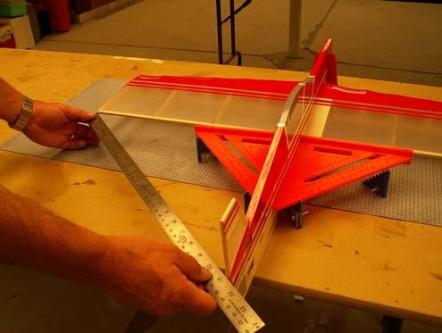 Ensure the trailing edge of the wing is 90º to the fuse. 8.
