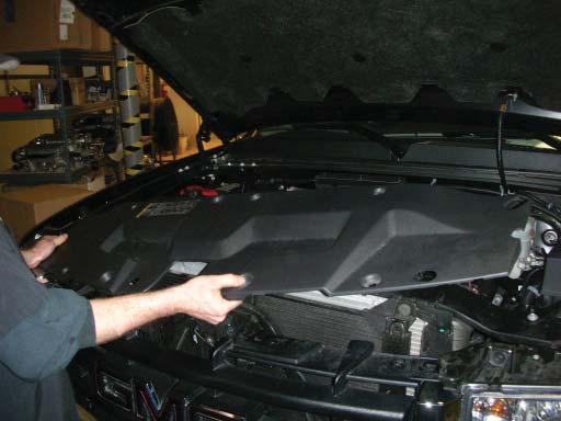 Reinstall the radiator support cover on the vehicle using the stock hardware