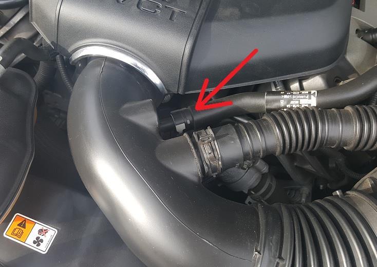 j) Remove the breather hose connected to the intake tube.
