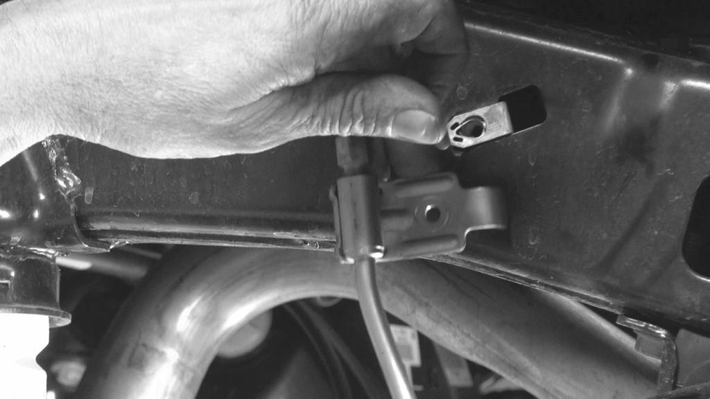 Remove the brake line mount from the frame with a 10mm. REAR SPRINGS Carefully lower the axle enough to remove the spring. Be sure to watch the ABS, brake lines and breather tubes for overextension.