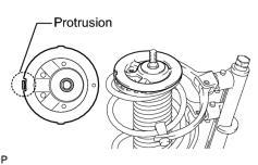 (e) Install the upper insulator and spring seat.