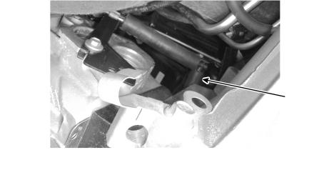 7. Remove the brake booster vacuum hose from the intake manifold. See Figure 6. LEFT SIDE OF TRANSMISSION BELL HOUSING FIGURE 6 8.