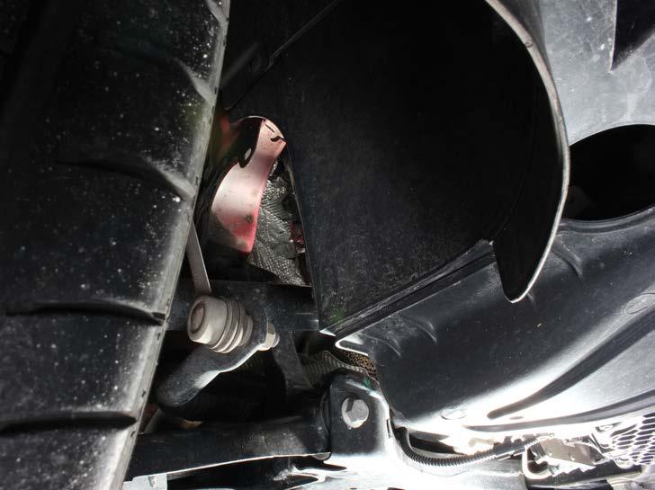 8. Unscrew the two down pipe s bracket