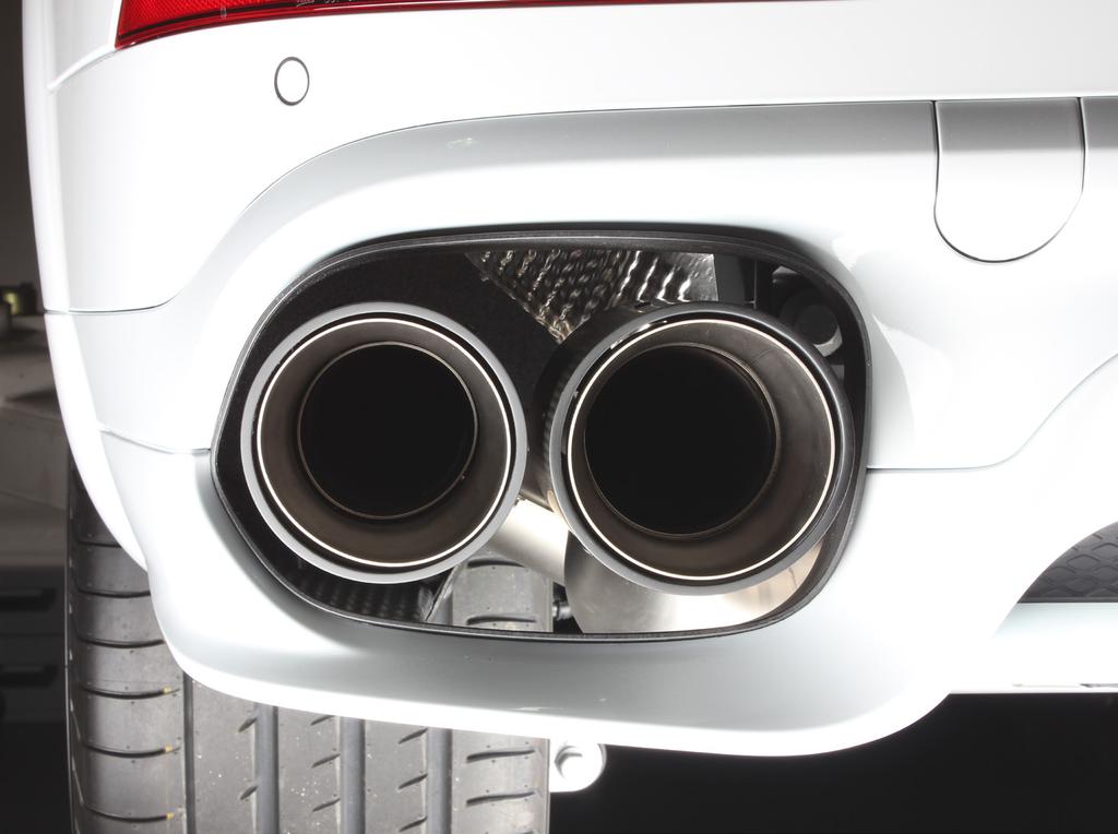11. Slide the outer tail-pipes onto the muffler outlets.