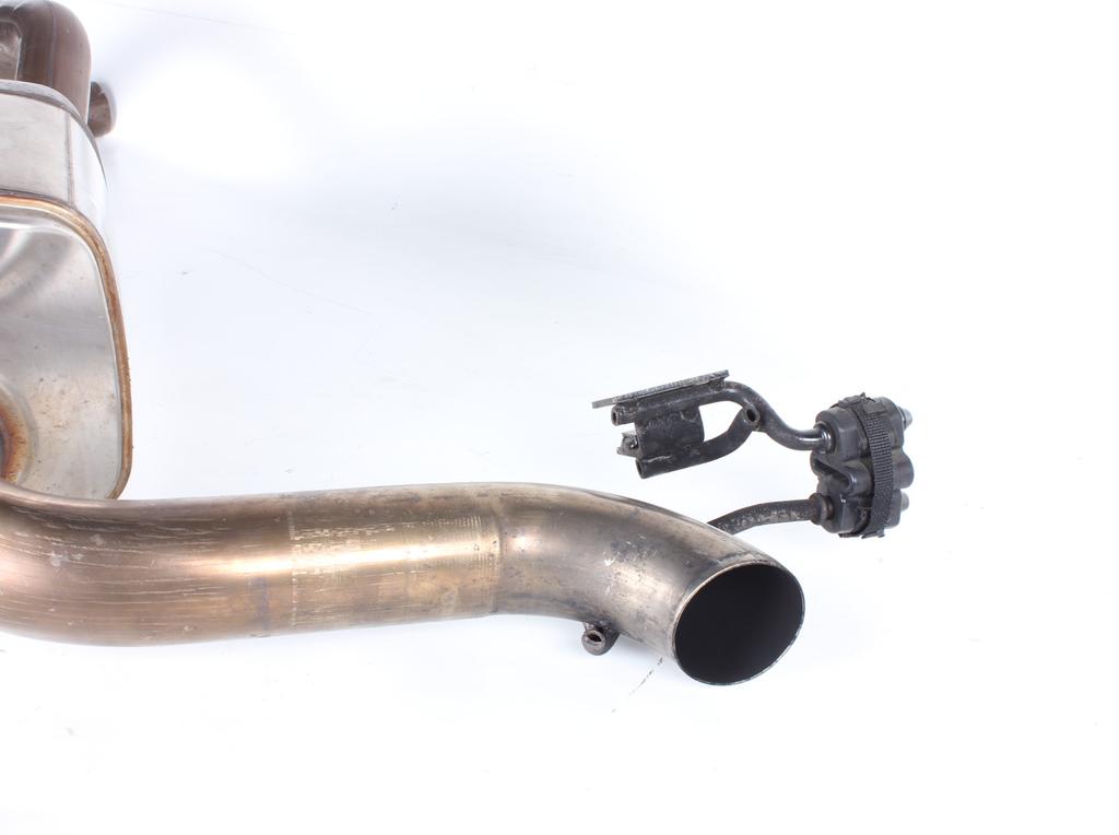 6. Carefully remove the rear rubber brackets off the muffler (Figure 8).