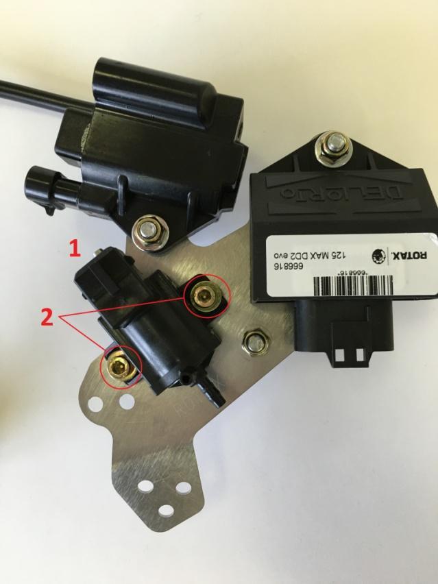 Please note: ECU and mounting plate has the same shape in this area (3) STEP 4 Take solenoid valve (1) and