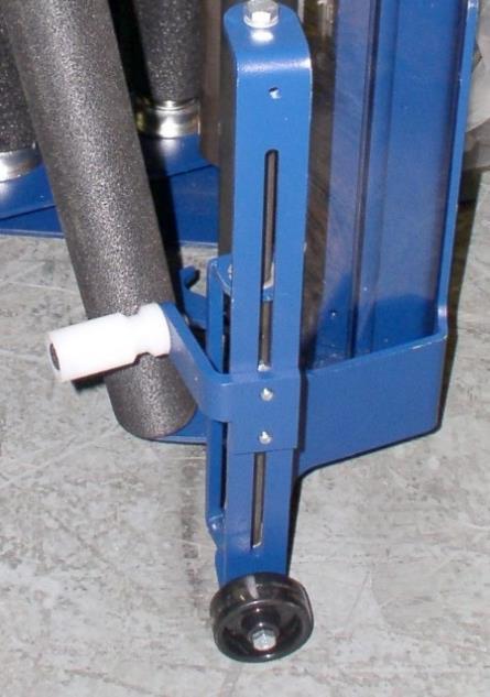 RETROFIT INSTALLATION 16. Adjust the height of the groove roller on the Film Roper. For a standard pallet, the top of the guide roller is 203 mm (8 ) from the floor.
