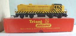 3.01B 00 Locomotives - Tri-ang, with boxes Tri-ang R155 T-C Series Bo-Bo Diesel 'Switcher'. Yellow with red lettering 'Triang Railways'. Black hazard chevrons all round.