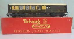 66 00-Railway - Tri-ang T-C Cars - silver-red Tri-ang R25 T-C Series bogie Saloon Car, silver with red window band, grey roof, single fixed red door each side at one end.
