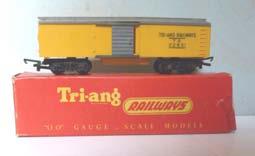 Tension-lock couplings. Almost mint. Boxed Price ( ): 7.50 3.134 Tri-ang R114 bogie Box Car. Orange, with grey roof and grey sliding door each side. Lettered 'Tri-ang Railways TR 22831'.