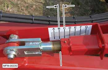Once the desired depth is reached (no more than 6 inches), the unit must be leveled by adjusting the frame leveling turnbuckle. a. Raise the locking mechanism from the turnbuckle. d. Check the frame for level.