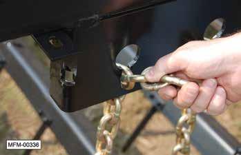 Typical Spring (finishing) settings are all three chains set with three links hanging. c. Loosen the jam nut on the front of the turnbuckle, and turn the adjusting nut on the rear of the turnbuckle to raise or lower the rolling basket.