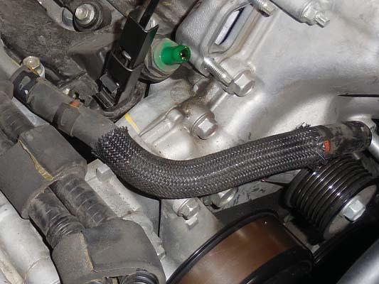 Inspect the OEM gaskets from the coolant crossover, and