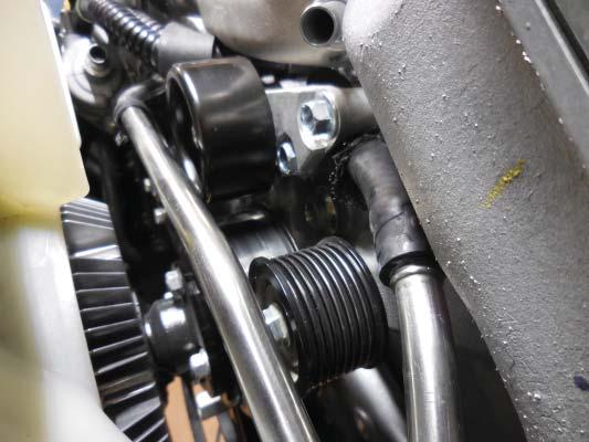 Connect provided oil cooler hard lines to the OEM hose