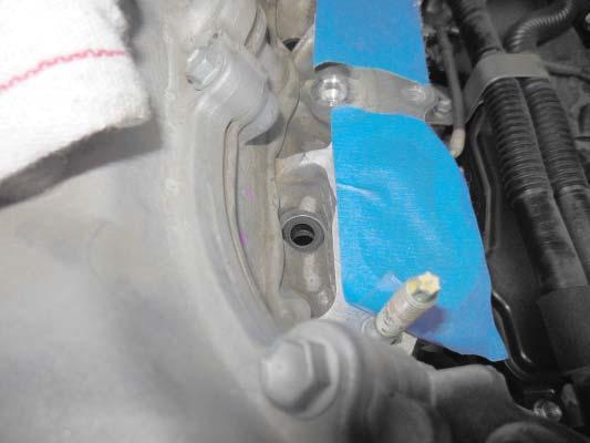 Note: Install the bolts deep enough so that they prevent the spacers from