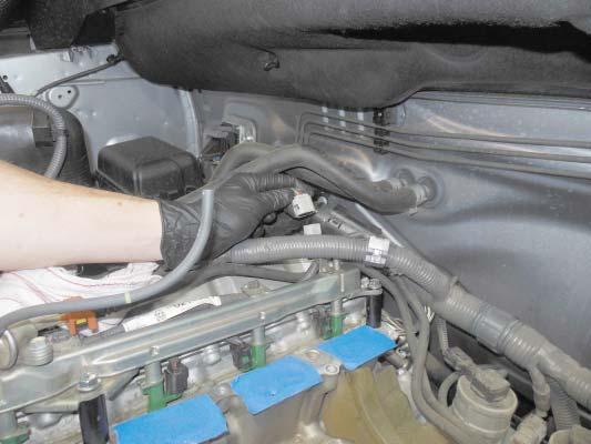 105. Plug in the fuel injector harness on the left and right hand sides.
