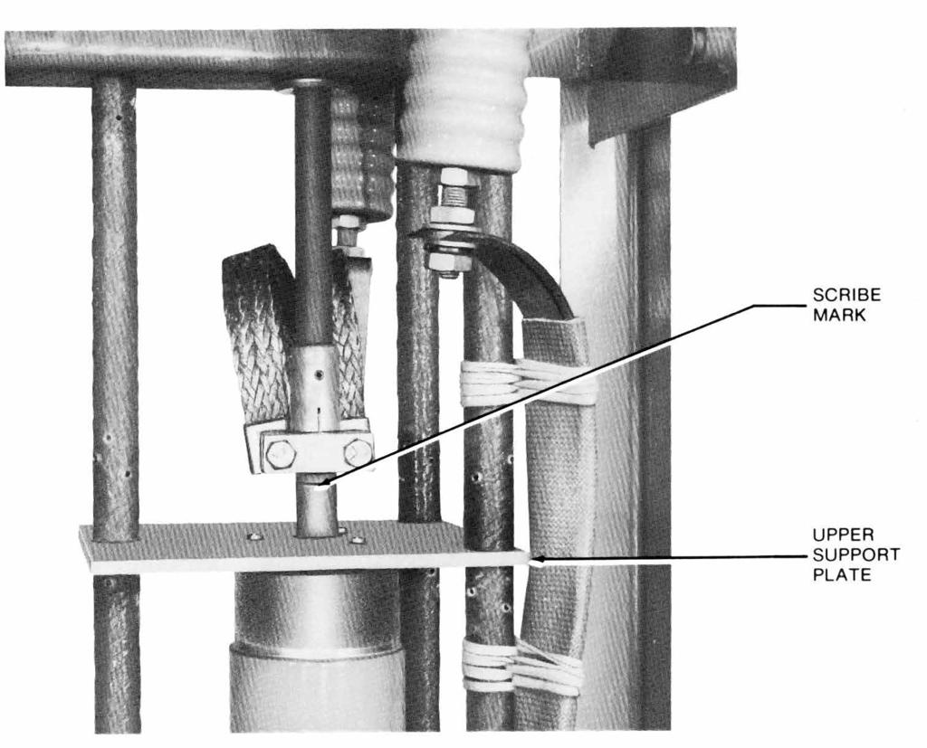 6. Lower the tank to expose the internal components: a. Attach the sheaves of the tank lifting windlass mechanism (Figure 4) to the recloser tank and take up the slack. Figure 5.