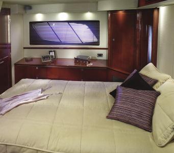 mattress and massage function, extra-large windows, an elegant dresser, and a convenient en suite dining table.