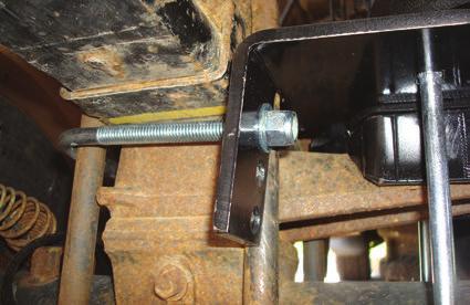 Evenly tighten only enough to draw the lower bracket to the Stock U-bolts at this time. fig. D.